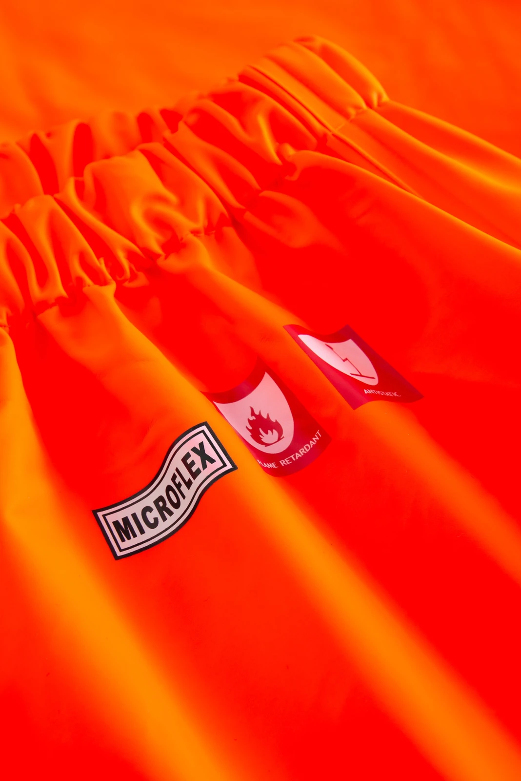 lyngsoe-fr-lr3052-flammhemmende-hi-vis-regenhose-leuchtorange-navy-detail-6 Lyngsøe FR-LR3052 Flammhemmende Hi-Vis Regenhose