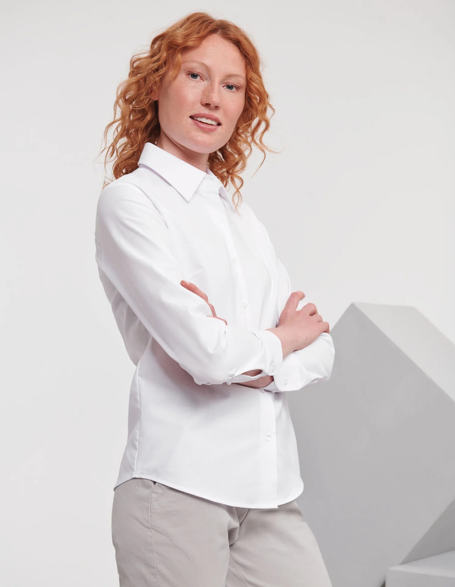 russell-r932f-ladies-ls-easy-care-oxford-shirt-white-model-1 Russell Ladies Long Sleeve Easy Care Oxford Shirt