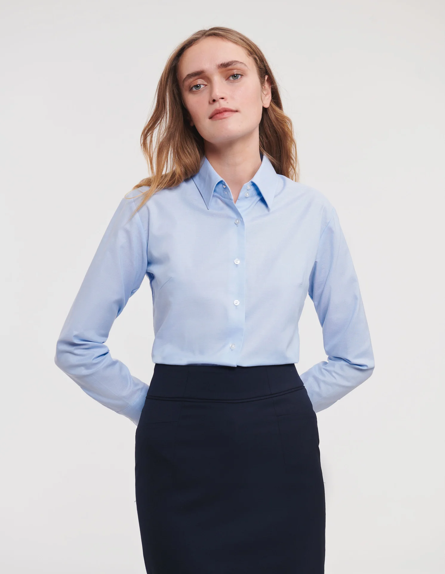 russell-r932f-ladies-ls-easy-care-oxford-shirt-oxfordblue-model-1 Russell Ladies Long Sleeve Easy Care Oxford Shirt