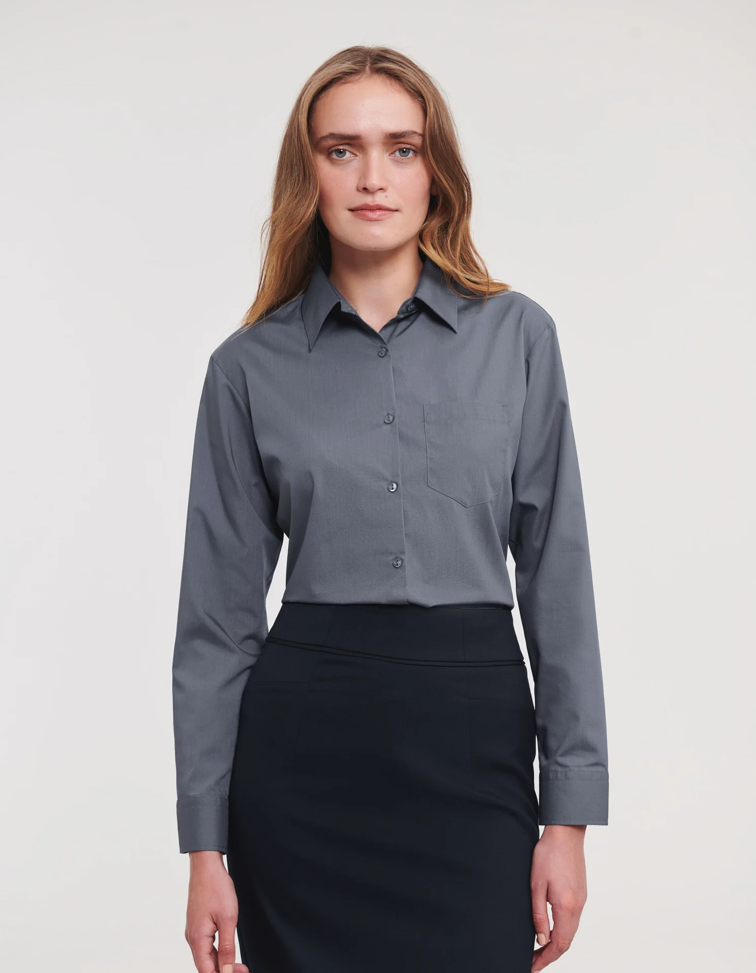 russell-r934f-ladies-ls-poly-cotton-easy-care-poplin-shirt-convoygrey-model-1 Russell Ladies Long Sleeve Polycotton Easy Care Poplin Shirt