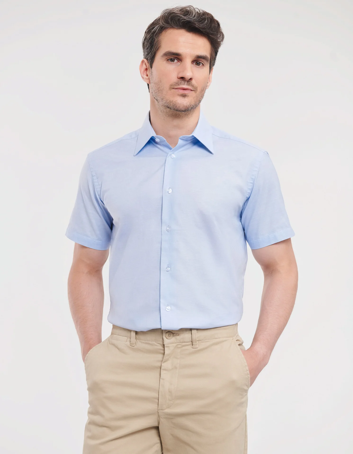 russell-r923m-mens-short-sleeve-easy-care-tailored-oxford-shirt-oxfordblue-model-1 Russell Men's Short Sleeve Easy Care Tailored Oxford Shirt