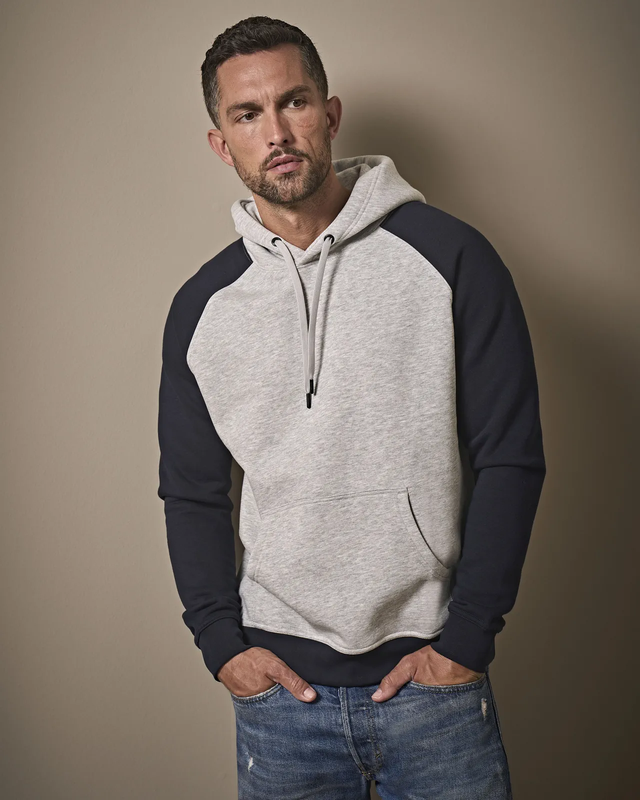 tee-jays-5432-two-tone-hooded-sweatshirt-heathergrey-navy-model-0 Tee Jays Two-Tone Hooded Sweatshirt