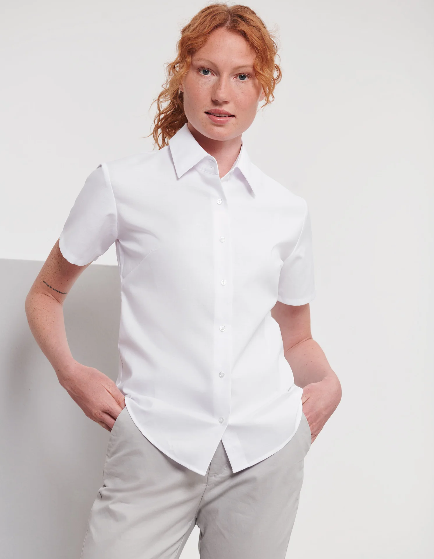 russell-r933f-ladies-short-sleeve-easy-care-oxford-shirt-white-model-1 Russell Ladies Short Sleeve Easy Care Oxford Shirt