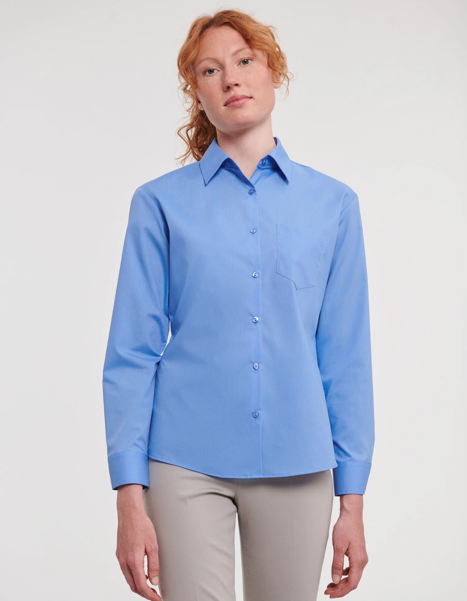 russell-r934f-ladies-ls-poly-cotton-easy-care-poplin-shirt-corporateblue-model-1 Russell Ladies Long Sleeve Polycotton Easy Care Poplin Shirt