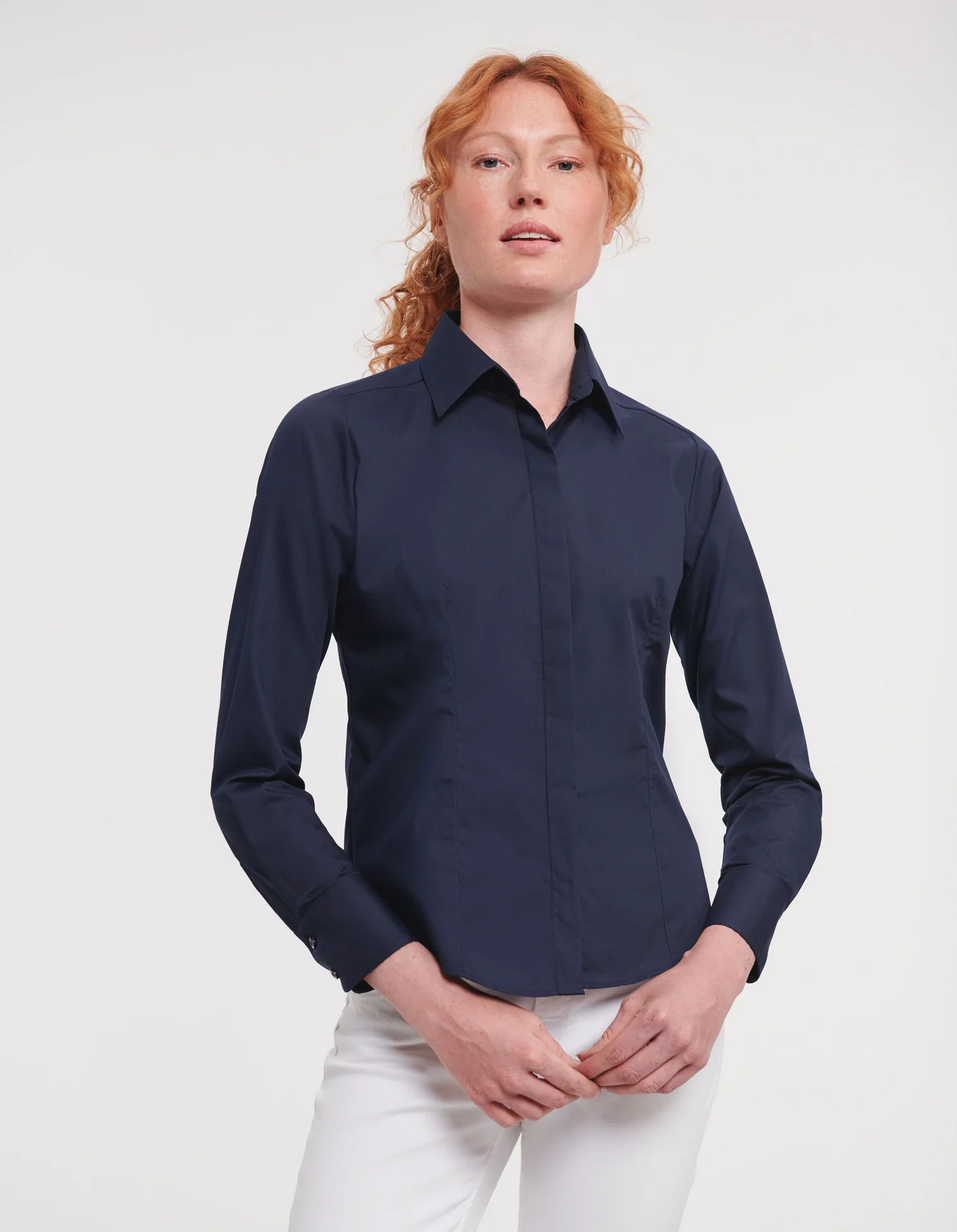 russell-r924f-ladies-ls-poly-cotton-easy-care-fitted-poplin-shirt-frenchnavy-model-1 Russell Ladies Long Sleeve Polycotton Easy Care Fitted Poplin Shirt