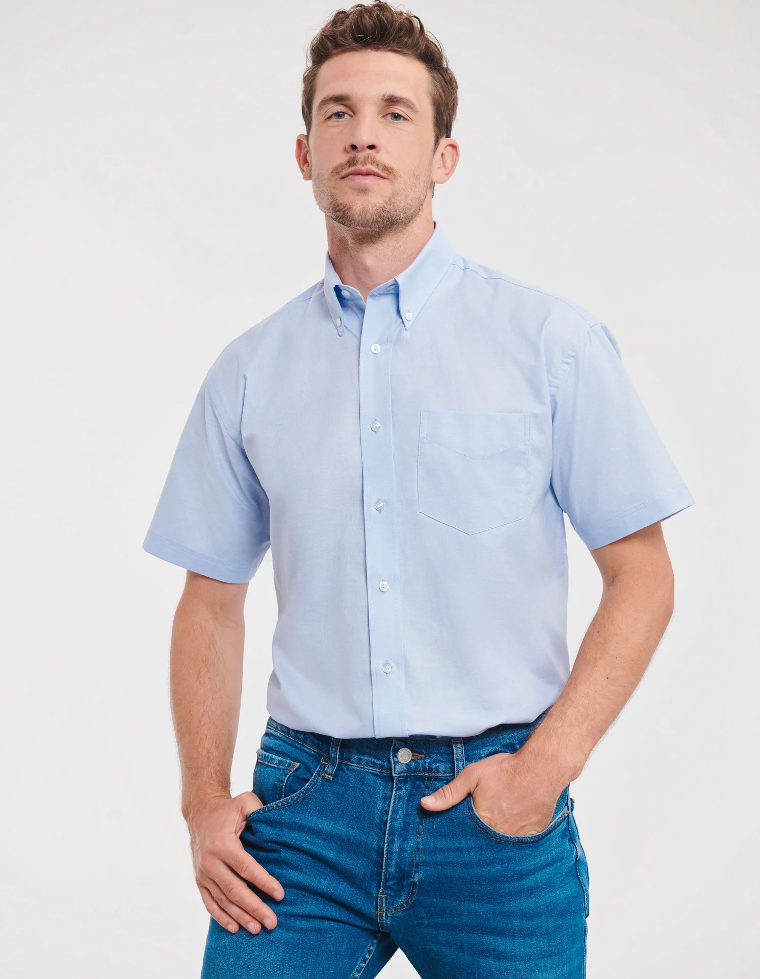 russell-r933m-mens-short-sleeve-easy-care-oxford-shirt-oxfordblue-model-1 Russell Men's Short Sleeve Easy Care Oxford Shirt