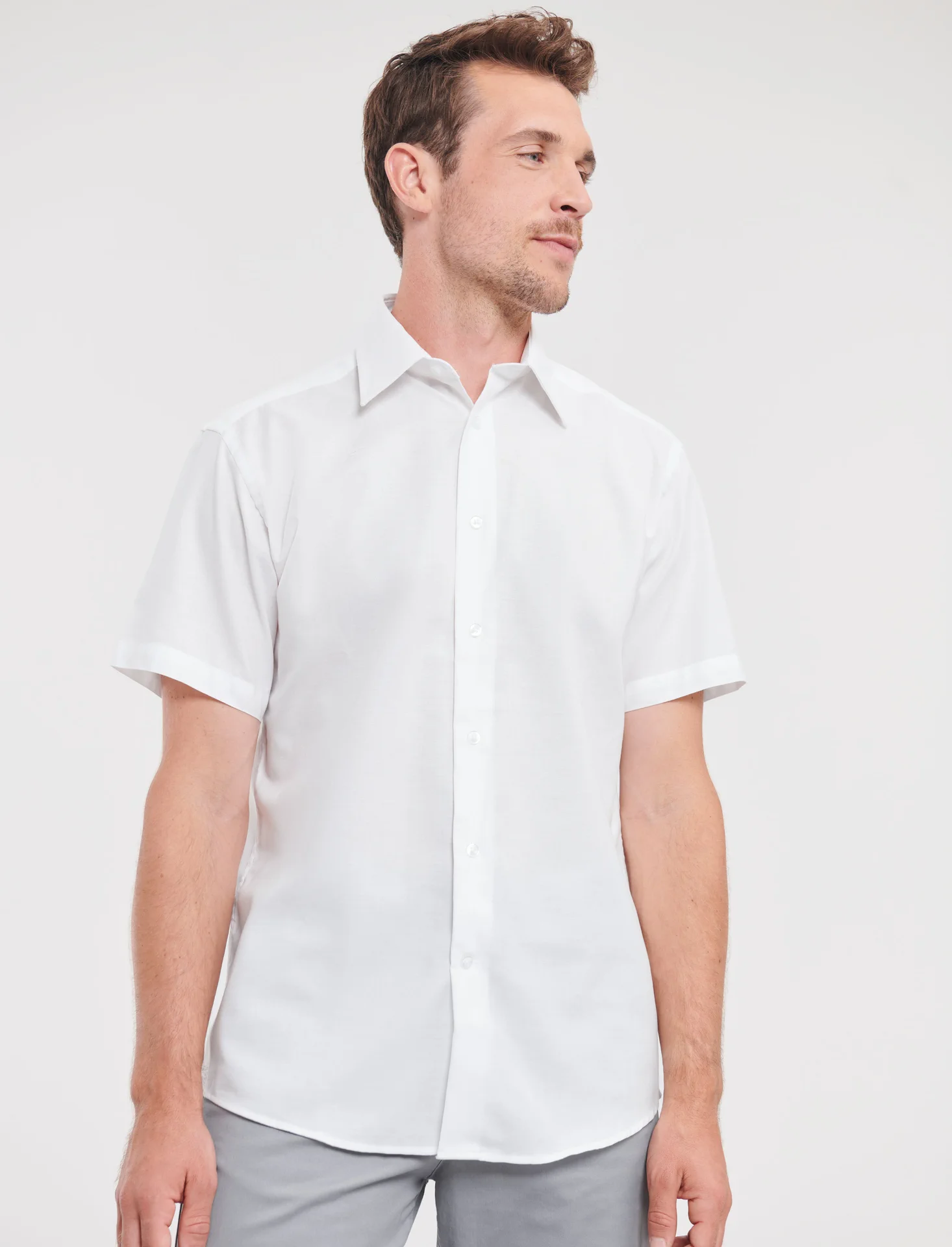 russell-r923m-mens-short-sleeve-easy-care-tailored-oxford-shirt-white-model-1 Russell Men's Short Sleeve Easy Care Tailored Oxford Shirt
