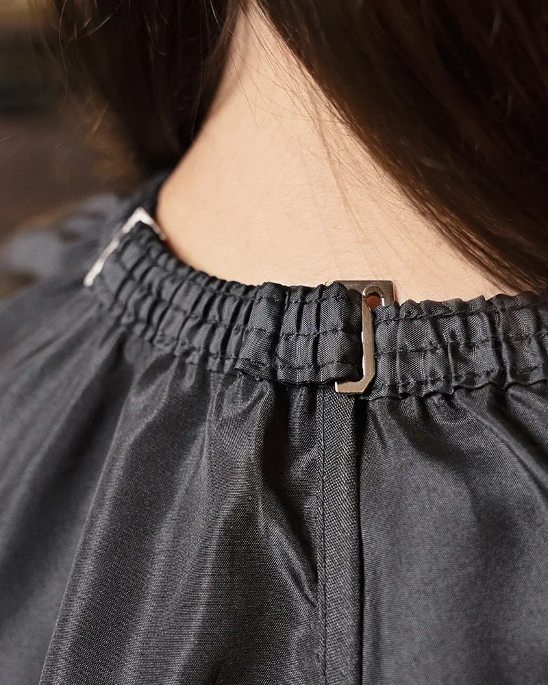 karlowsky-fb1-wasserabweisender-schneideumhang-mit-handdurchgriffen-black-detail-9 KARLOWSKY Wasserabweisender Schneideumhang mit Handdurchgriffen