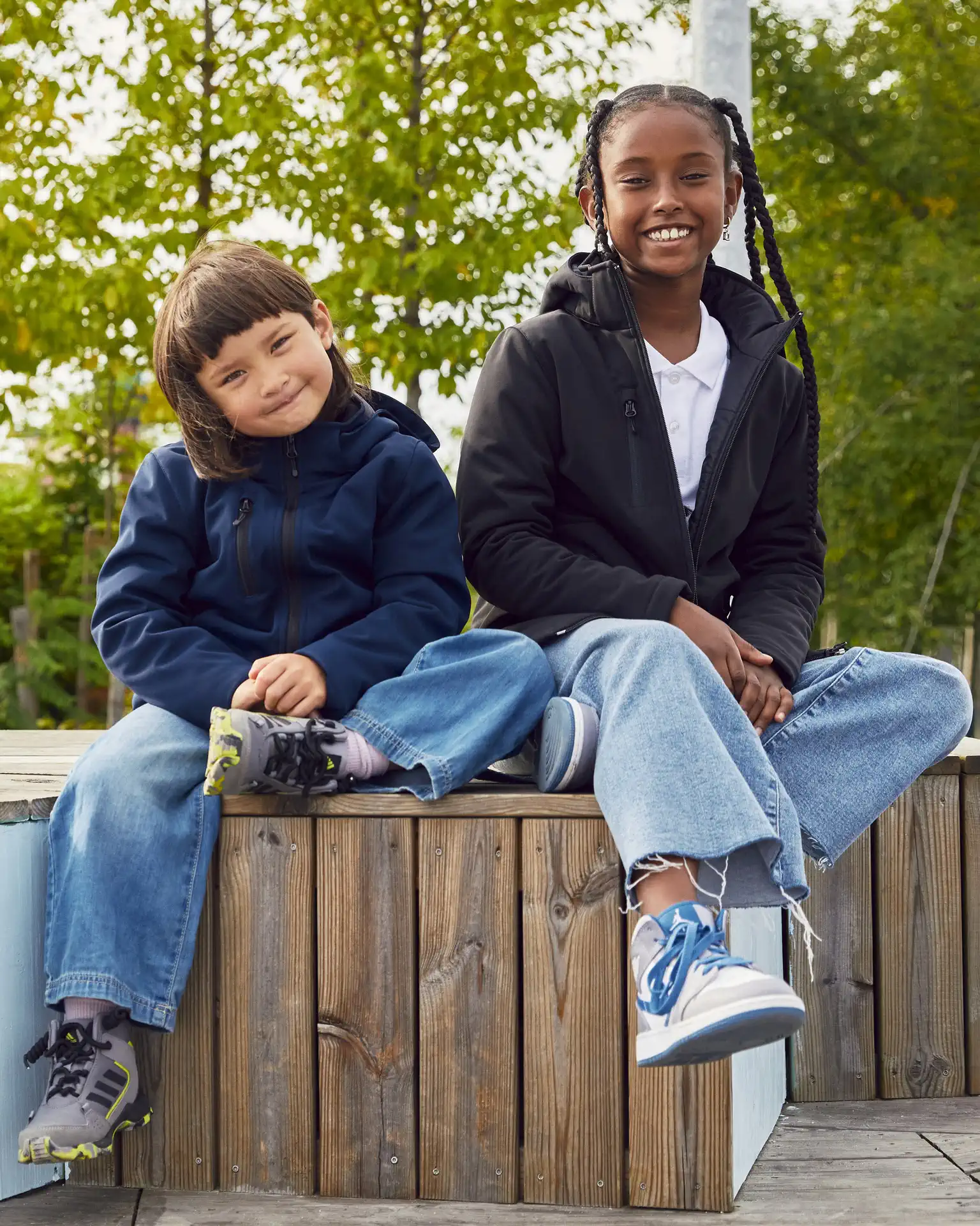 clique-0200906-padded-hooded-softshell-junior-model-0 CLIQUE Kinder Kapuzen Softshelljacke