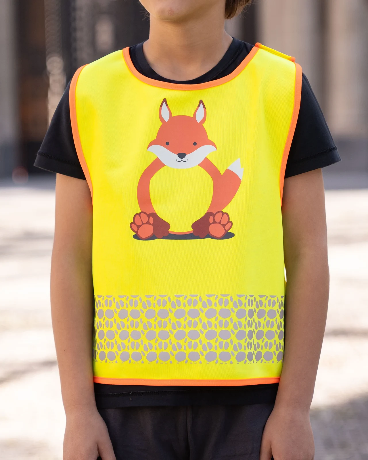 korntex-fun-childrens-safety-vest-funtastic-wildlife-co2-neutral-foxyellow-model-0 Korntex Kinder Warnweste Funtastic Wildlife