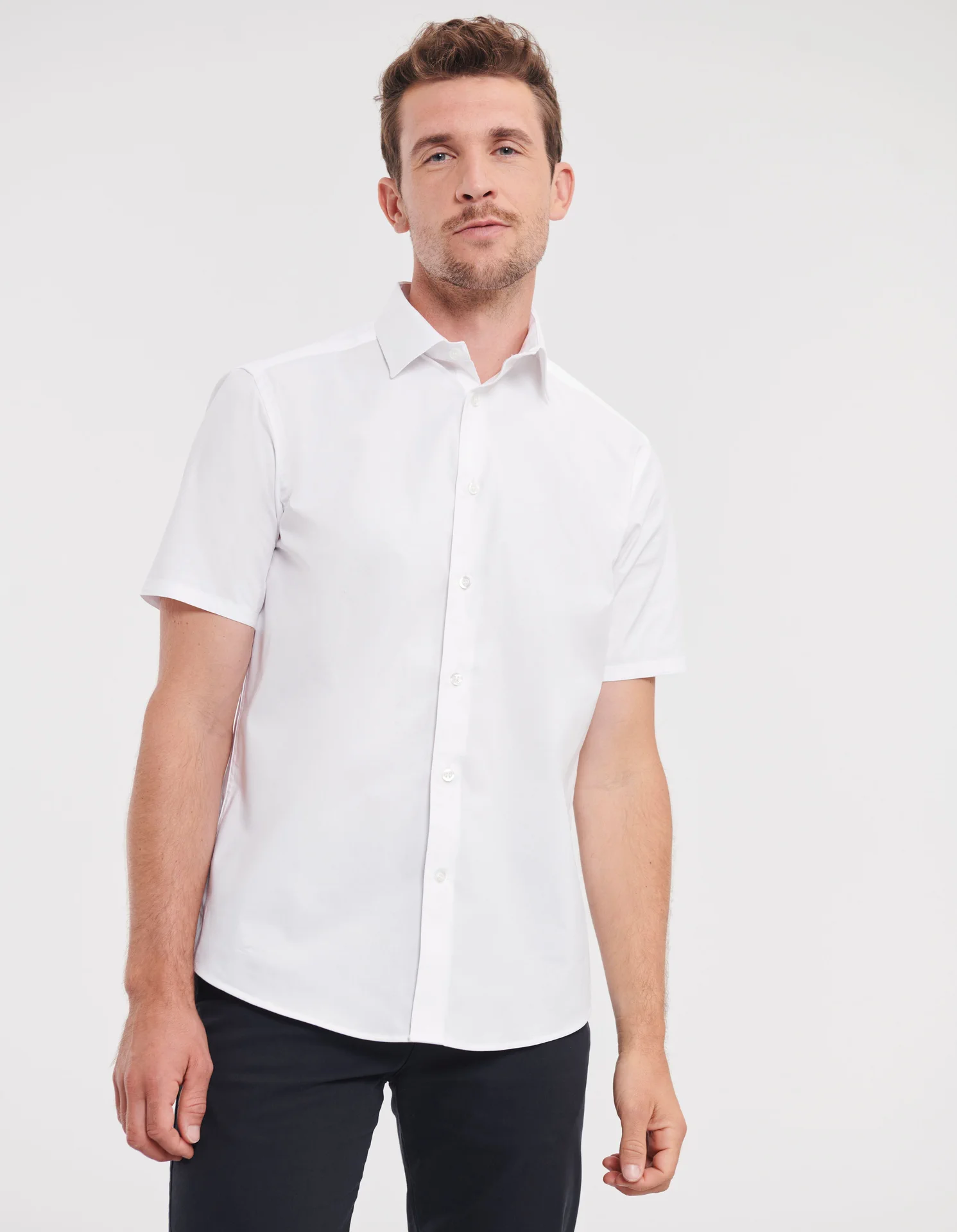 russell-r947m-mens-short-sleeve-easy-care-fitted-shirt-white-model-1 Russell Men's Short Sleeve Easy Care Fitted Shirt